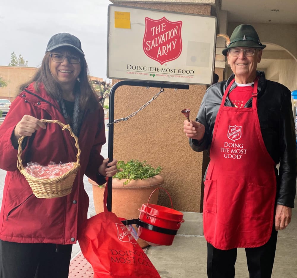 Laura Biever and Max Rumbaugh volunteer to ring Salvation Army's bells