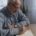 Older gentleman looking through documents.